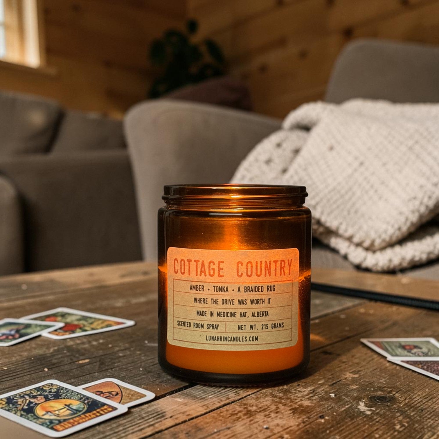 Cottage Country candle in amber glass jar, hand poured in Medicine Hat, Alberta