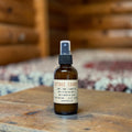 Cottage Country room spray in amber glass bottle, tonka and smoke scent, hand poured in Medicine Hat, Alberta