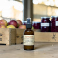 Farmhouse fundraiser room spray in amber glass bottle, hand poured in Medicine Hat, Alberta