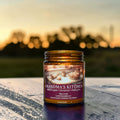 Grandma's Kitchen candle in amber glass jar, apple and cinnamon scent, hand poured in Medicine Hat, Alberta