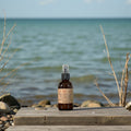 Elkwater Lake room spray in amber glass bottle, Lunahrin Candles