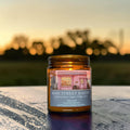 Main Street Bakery candle in amber glass jar, cinnamon and sugar scent, hand poured in Medicine Hat, Alberta