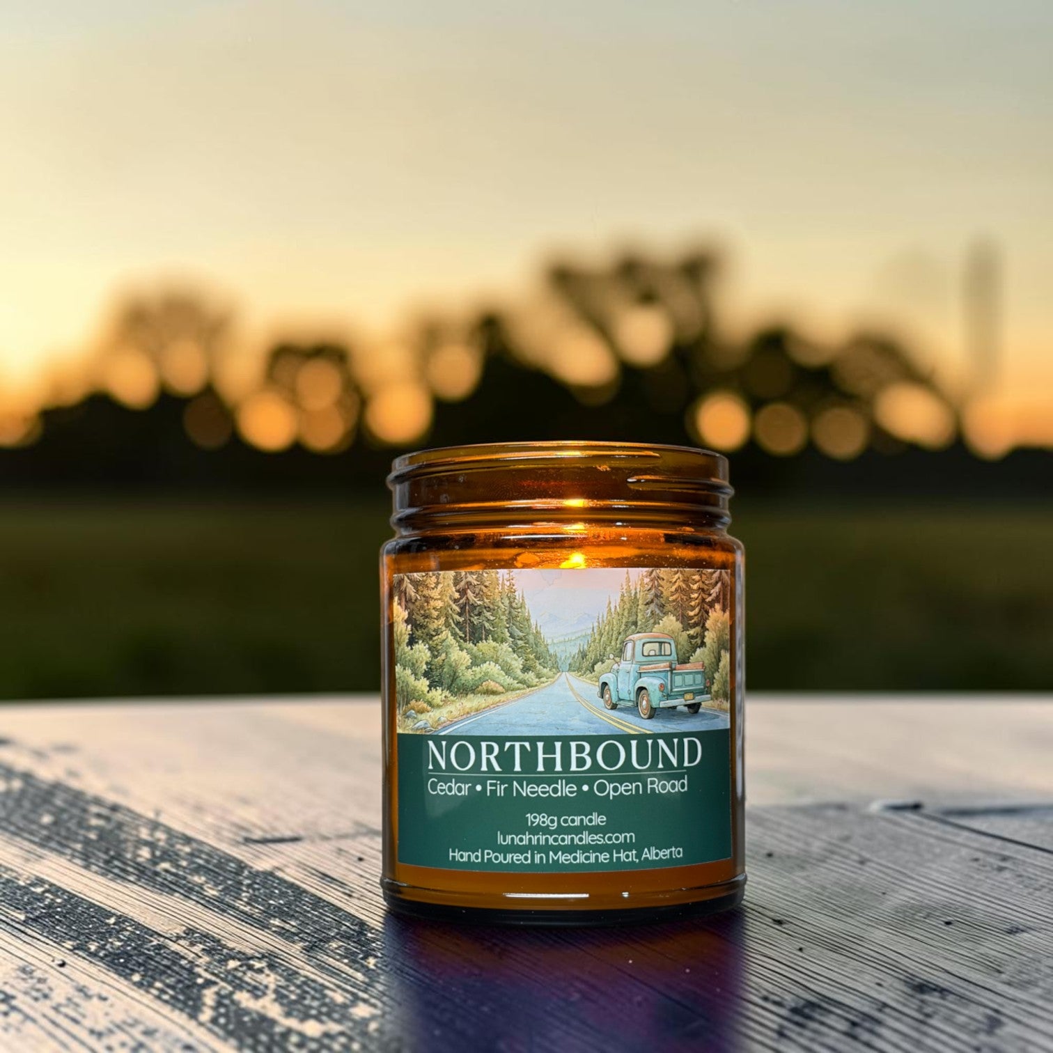 Northbound candle in amber glass jar, cedar and fir needle scent, hand poured in Medicine Hat, Alberta