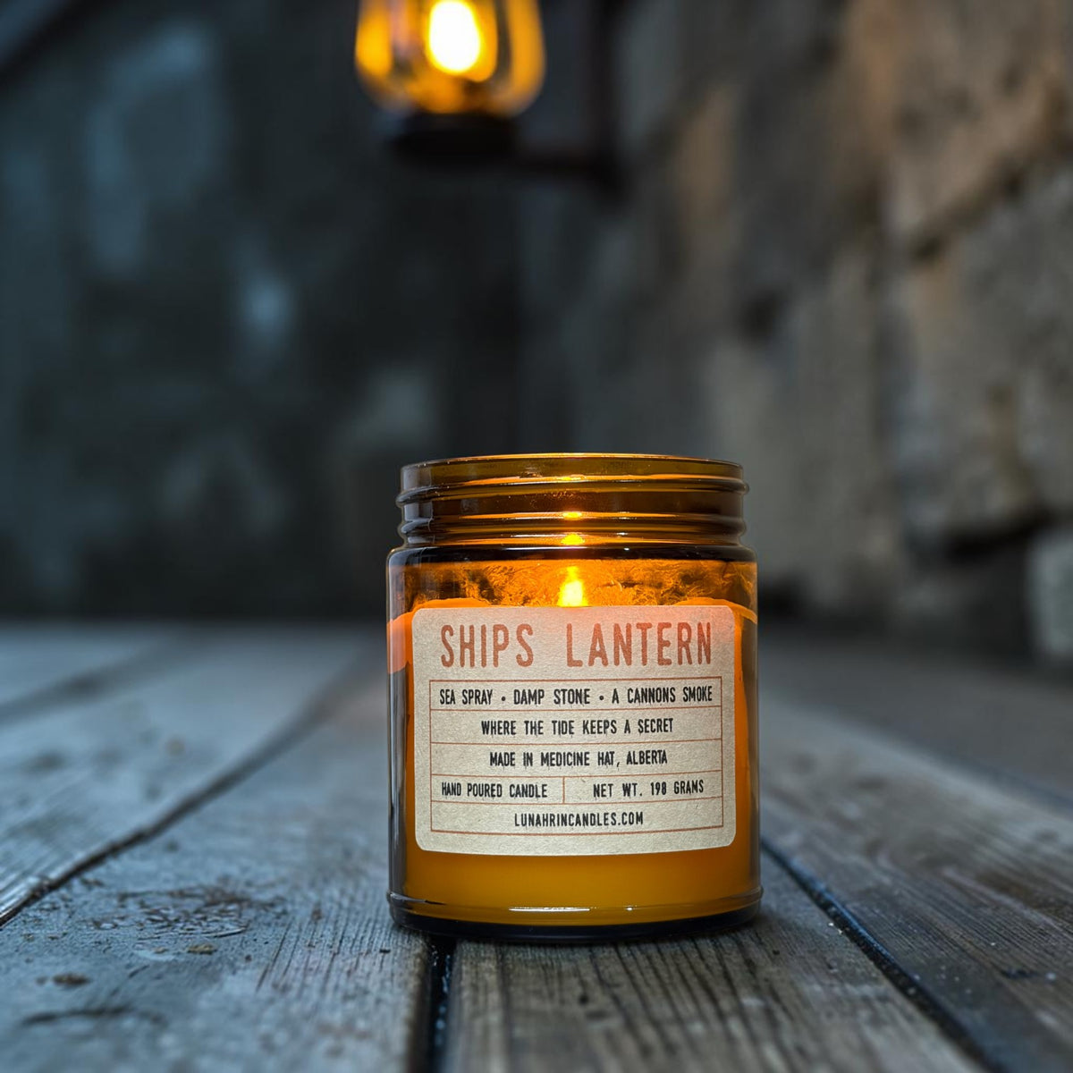 Ships Lantern candle in amber glass jar, sea spray and damp stone scent, hand poured in Medicine Hat, Alberta